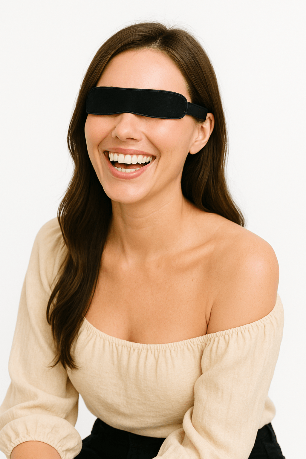 Girl sitting and smiling while wearing Wizard Research electric heated eye mask