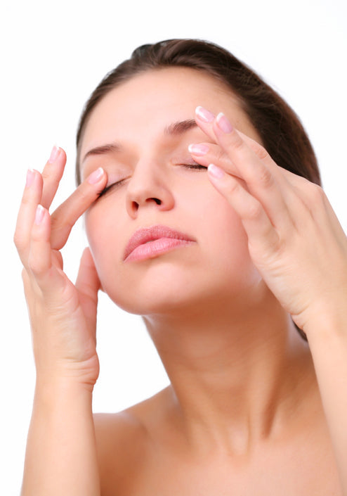 massaging eyes